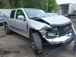 2012 GMC Canyon SLE1 with VIN 1GTH6MFE8C8106648, listed as a IAAI auction lot 42263908 with 206,507 mi miles and . Bid and sale history available at DreamBid. Image 1.