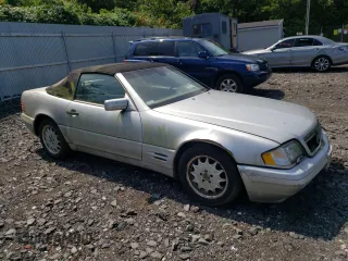 1997 Mercedes-Benz SL-Class with VIN WDBFA67FXVF142041, listed as a Copart auction lot 69598214 with 0 mi miles and Clean Title. Bid and sale history available at carsss.com. Image 4.