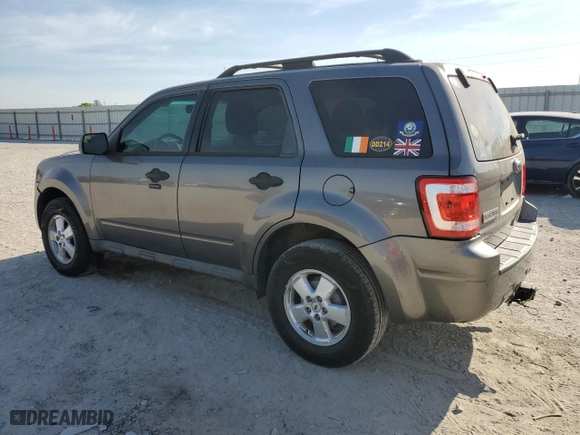 2010 Ford Escape XLT with VIN 1FMCU0DG6AKD05058, listed as a Copart auction lot 50449035 with 127,781 mi miles and Salvage Title. Bid and sale history available at carsss.com. Image 2.