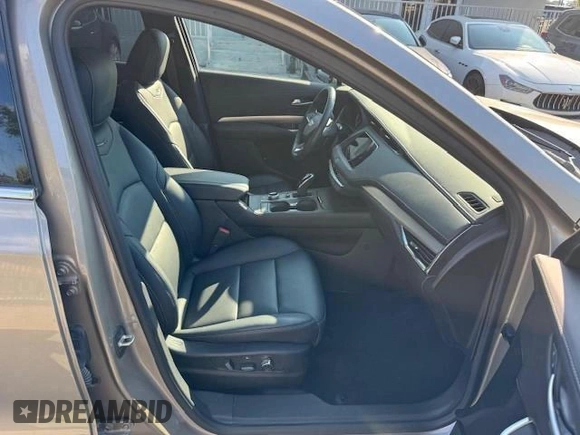 2023 Cadillac XT4 AWD Premium Luxury with VIN 1GYFZDR40PF108407, listed as a Copart auction lot 62037155 with 8,724 mi miles and Non repairable. Bid and sale history available at DreamBid. Image 7.