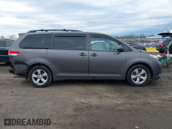 2012 Toyota Sienna XLE AAS with VIN 5TDYK3DC0CS252965, listed as a IAAI auction lot 42059909 with 321,983 mi miles and . Bid and sale history available at carsss.com. Image 13.