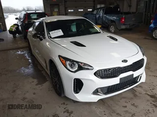 2021 Kia Stinger GT-Line with VIN KNAE15LA5M6087950, listed as a IAAI auction lot 41555118 with 19,675 mi miles. Bid and sale history available at carsss.com. Image 1.
