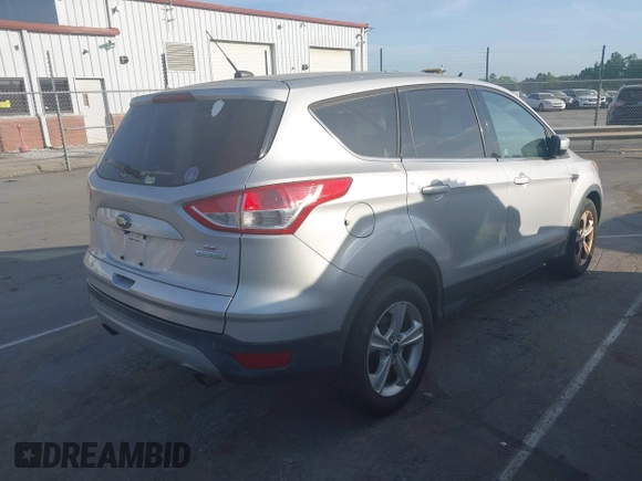2014 Ford Escape SE z VIN 1FMCU0GX3EUE33604, wystawiony jako IAAI lot #42080186 z przebiegiem 149 930 mil mil oraz . Historia ofert i sprzedaży dostępna na DreamBid. Obrazek 4.
