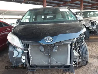 2012 Toyota Sienna XLE AAS with VIN 5TDYK3DC6CS263128, listed as a IAAI auction lot 41583798 with 114,820 mi miles. Bid and sale history available at carsss.com. Image 6.