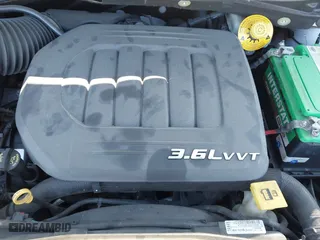 2016 Dodge Grand Caravan SXT with VIN 2C4RDGCG2GR390001, listed as a IAAI auction lot 41943622 with 127,328 mi miles. Bid and sale history available at carsss.com. Image 10.