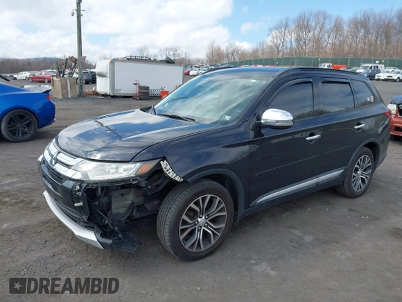 2016 Mitsubishi Outlander SE with VIN JA4AD3A39GZ003885, listed as a IAAI auction lot 41869646 with 193,320 mi miles and . Bid and sale history available at DreamBid. Image 2.