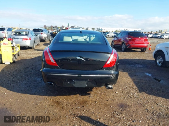 2015 Jaguar XJ with VIN SAJWA1CZ2F8V84677, listed as a IAAI auction lot 41723372 with 52,888 mi miles. Bid and sale history available at carsss.com. Image 16.