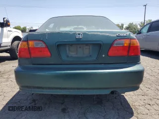 2000 Honda Civic VP z VIN 2HGEJ6619YH556175, wystawiony jako Copart lot #57518555 z przebiegiem 153 087 mil mil oraz Czysty tytuł • Clean title. Historia ofert i sprzedaży dostępna na DreamBid. Obrazek 6.