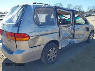 2004 Honda Odyssey EX-L with VIN 5FNRL18924B107971, listed as a IAAI auction lot 41699067 with Not Provided miles and . Bid and sale history available at DreamBid. Image 4.