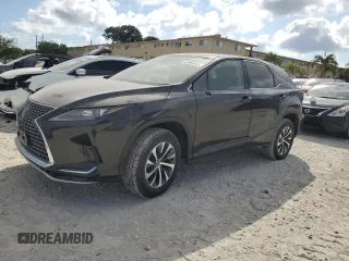2022 Lexus RX with VIN 2T2AZMAA9NC221100, listed as a Copart auction lot 43990565 with 9,890 mi miles and Clean Title. Bid and sale history available at carsss.com. Image 1.
