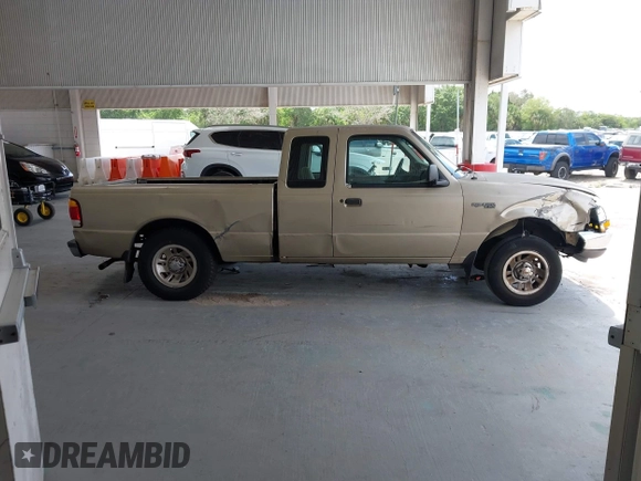 1999 Ford Ranger XL z VIN 1FTYR14V8XTA65823, wystawiony jako IAAI lot #42451126 z przebiegiem 249 406 mil mil oraz . Historia ofert i sprzedaży dostępna na DreamBid. Obrazek 13.