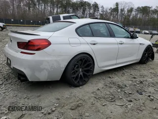 2014 BMW 6 Series 650i xDrive z VIN WBA6B4C54ED371324, wystawiony jako Copart lot #49016325 z przebiegiem 113 395 mil mil oraz Szkoda całkowita • Salvage title. Historia ofert i sprzedaży dostępna na DreamBid. Obrazek 3.