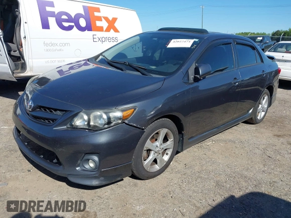 2011 Toyota Corolla L with VIN 2T1BU4EE2BC684289, listed as a IAAI auction lot 42027474 with 214,657 mi miles. Bid and sale history available at carsss.com. Image 2.