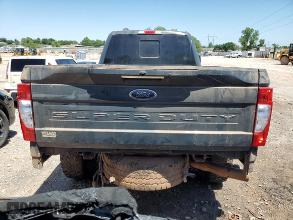 2021 Ford F-350 XL with VIN 1FT8W3BT1MEC69708, listed as a Copart auction lot 56928725 with 106,637 mi miles and Salvage title. Bid and sale history available at DreamBid. Image 6.