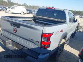 2023 Nissan Frontier Pro-4X with VIN 1N6ED1EK7PN604374, listed as a IAAI auction lot 41828936 with 60,452 mi miles and . Bid and sale history available at DreamBid. Image 4.