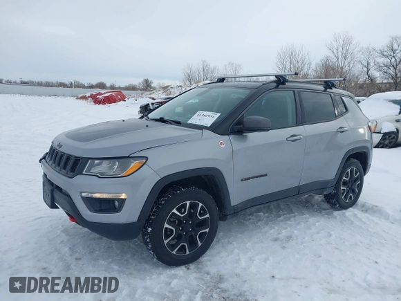 2020 Jeep Compass Trailhawk with VIN 3C4NJDDB1LT203329, listed as a IAAI auction lot 41301931 with 79,035 mi miles and . Bid and sale history available at carsss.com. Image 18.