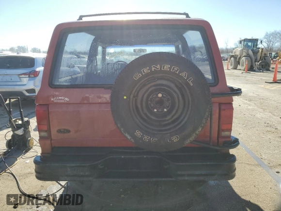 1988 Ford Bronco с VIN 1FMCU14T2JUB33747, выставлен на аукционе Copart как лот 42911345 с пробегом 31 761 миль миль и Списание • Salvage title. История ставок и продаж доступна на DreamBid. Изображение 6.