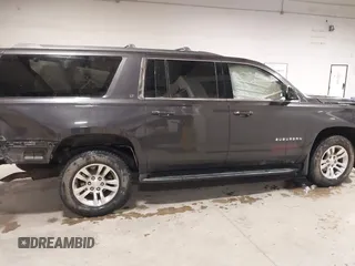 2018 Chevrolet Suburban LT z VIN 1GNSKHKC7JR173463, wystawiony jako IAAI lot #41640353 z przebiegiem Nie podano mil oraz . Historia ofert i sprzedaży dostępna na DreamBid. Obrazek 13.