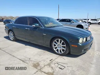 2008 Jaguar XJ with VIN SAJWA79B08SH23050, listed as a Copart auction lot 47886605 with 55,463 mi miles and Salvage Title. Bid and sale history available at carsss.com. Image 4.