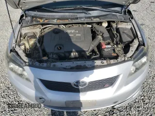 2010 Toyota Corolla z VIN 1NXBU4EE2AZ380585, wystawiony jako Copart lot #57024125 z przebiegiem 175 334 mil mil oraz Szkoda całkowita • Salvage title. Historia ofert i sprzedaży dostępna na DreamBid. Obrazek 11.