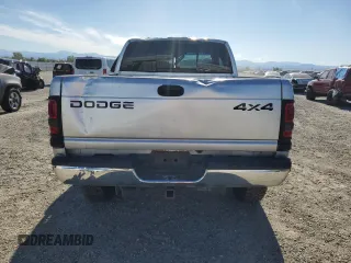 2001 Dodge 2500 z VIN 3B7KF23691G767197, wystawiony jako Copart lot #56122385 z przebiegiem 205 557 mil mil oraz Nie do naprawy • Non repairable. Historia ofert i sprzedaży dostępna na DreamBid. Obrazek 6.