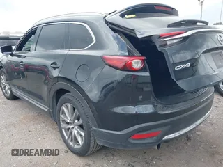 2018 Mazda CX-9 Grand Touring with VIN JM3TCADY3J0205878, listed as a IAAI auction lot 42178507 with 243,703 mi miles and . Bid and sale history available at DreamBid. Image 3.