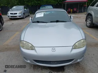2002 Mazda MX-5 Miata Cloth with VIN JM1NB353820229890, listed as a IAAI auction lot 42750045 with 116,227 mi miles and . Bid and sale history available at DreamBid. Image 6.