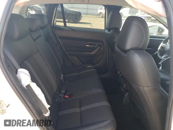 2024 Mazda CX-50 S Preferred with VIN 7MMVABBM6RN200511, listed as a Copart auction lot 77151384 with 7,455 mi miles and Salvage Title. Bid and sale history available at DreamBid. Image 11.