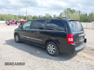 2010 Chrysler Town & Country Touring with VIN 2A4RR5DX5AR329523, listed as a IAAI auction lot 41941874 with 207,079 mi miles. Bid and sale history available at carsss.com. Image 3.