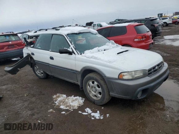 1997 Subaru Legacy Outback with VIN 4S3BG6858V6646771, listed as a Copart auction lot 79514484 with 216,013 mi miles and Non repairable. Bid and sale history available at DreamBid. Image 4.