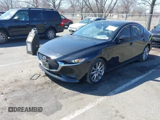 2021 Mazda 3 Select with VIN JM1BPBBL8M1305141, listed as a IAAI auction lot 41762686 with 41,212 mi miles and . Bid and sale history available at DreamBid. Image 2.