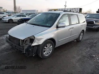 2007 Kia Sedona LX with VIN KNDMB233976172127, listed as a IAAI auction lot 41557356 with 164,383 mi miles. Bid and sale history available at carsss.com. Image 2.
