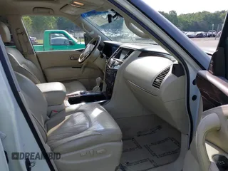 2012 Infiniti QX56 7-passenger z VIN JN8AZ2NE7C9023063, wystawiony jako IAAI lot #42145130 z przebiegiem 149 172 mil mil oraz . Historia ofert i sprzedaży dostępna na DreamBid. Obrazek 5.
