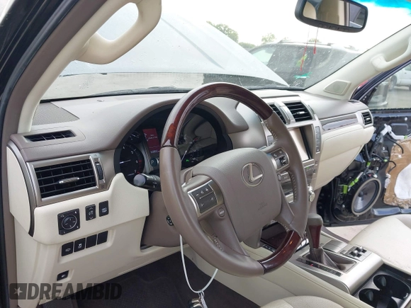 2014 Lexus GX with VIN JTJBM7FX0E5069997, listed as a IAAI auction lot 42076860 with 122,800 mi miles. Bid and sale history available at carsss.com. Image 22.