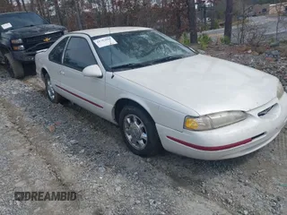 1997 Ford Thunderbird LX with VIN 1FALP62W6VH142784, listed as a IAAI auction lot 41792883 with 244,300 mi miles. Bid and sale history available at carsss.com. Image 1.