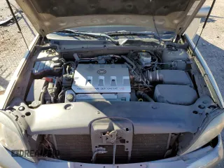 2002 Cadillac DeVille DHS z VIN 1G6KE54Y62U248629, wystawiony jako Copart lot #79825284 z przebiegiem 99 568 mil mil oraz Szkoda całkowita • Salvage title. Historia ofert i sprzedaży dostępna na DreamBid. Obrazek 11.