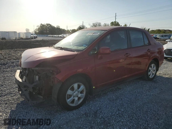 2010 Nissan Versa S with VIN 3N1BC1AP6AL443004, listed as a Copart auction lot 52010495 with 118,801 mi miles and Non Repairable. Bid and sale history available at DreamBid. Image 1.