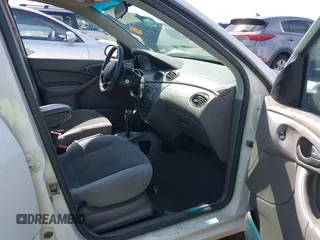 2004 Ford Focus SE z VIN 1FAFP34Z44W103852, wystawiony jako IAAI lot #42395073 z przebiegiem Nie podano mil oraz . Historia ofert i sprzedaży dostępna na DreamBid. Obrazek 5.
