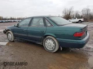1995 Ford Taurus GL with VIN 1FALP52U1SA108202, listed as a Copart auction lot 85676434 with 102,669 mi miles and Salvage Title. Bid and sale history available at carsss.com. Image 2.