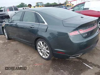 2016 Lincoln MKZ z VIN 3LN6L2GK4GR605486, wystawiony jako IAAI lot #42609084 z przebiegiem Nie podano mil oraz . Historia ofert i sprzedaży dostępna na DreamBid. Obrazek 3.