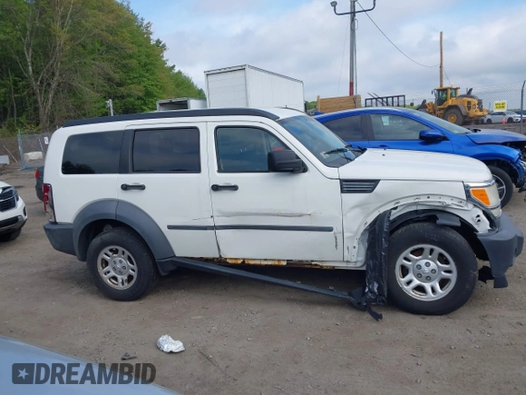 2007 Dodge Nitro SXT z VIN 1D8GU28K87W652037, wystawiony jako IAAI lot #42172950 z przebiegiem 172 487 mil mil oraz . Historia ofert i sprzedaży dostępna na DreamBid. Obrazek 13.