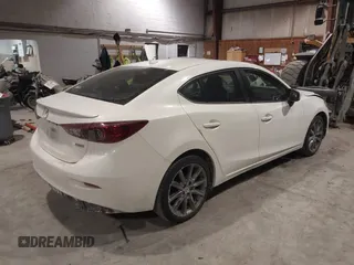 2018 Mazda 3 Touring z VIN 3MZBN1V32JM188650, wystawiony jako IAAI lot #41428819 z przebiegiem 225 611 mil mil oraz . Historia ofert i sprzedaży dostępna na DreamBid. Obrazek 4.