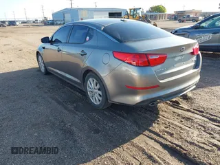 2015 Kia Optima EX z VIN 5XXGN4A7XFG402635, wystawiony jako IAAI lot #41952546 z przebiegiem 121 390 mil mil oraz . Historia ofert i sprzedaży dostępna na DreamBid. Obrazek 3.
