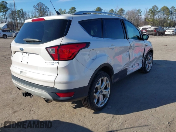 2019 Ford Escape Titanium with VIN 1FMCU9J91KUB21842, listed as a IAAI auction lot 41632210 with 104,900 mi miles. Bid and sale history available at carsss.com. Image 4.