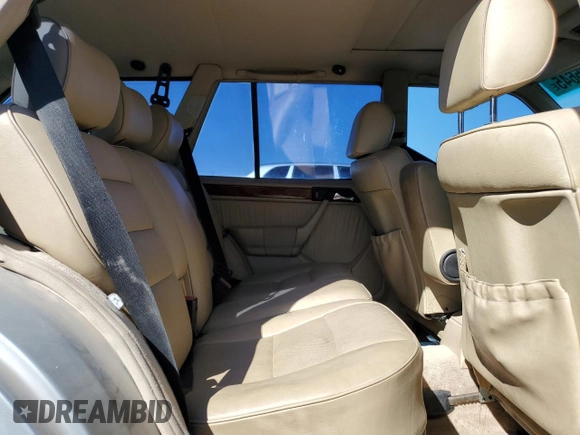 1994 Mercedes-Benz E with VIN WDBEA92E2RF283381, listed as a Copart auction lot 50025645 with 131,140 mi miles and Salvage Title. Bid and sale history available at DreamBid. Image 11.