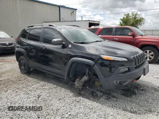 2018 Jeep Cherokee Trailhawk with VIN 1C4PJMBB0JD500672, listed as a Copart auction lot 63207915 with 72,954 mi miles and Salvage title. Bid and sale history available at DreamBid. Image 4.