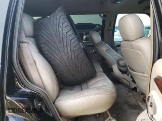 1999 Cadillac Escalade z VIN 1GYEK13R7XR405790, wystawiony jako Copart lot #84478384 z przebiegiem 244 195 mil mil oraz Szkody całkowita. Historia ofert i sprzedaży dostępna na DreamBid. Obrazek 11.