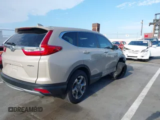 2017 Honda CR-V EX-L with VIN 5J6RW2H85HL022012, listed as a IAAI auction lot 40020013 with 94,450 mi miles. Bid and sale history available at carsss.com. Image 4.