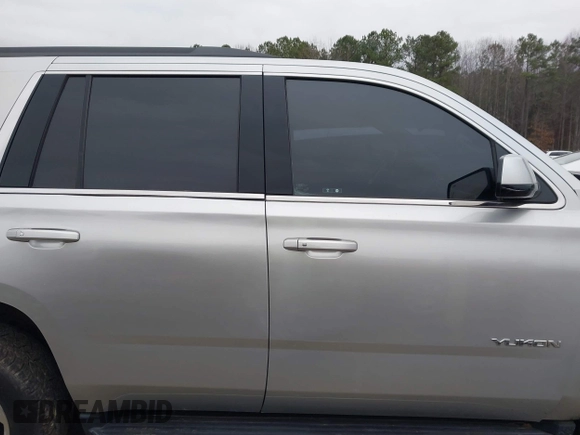 2020 GMC Yukon SLT with VIN 1GKS2BKC3LR228116, listed as a IAAI auction lot 41465949 with 91,198 mi miles. Bid and sale history available at carsss.com. Image 14.
