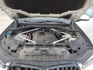2023 BMW X6 xDrive40i with VIN 5UXCY6C08P9P28397, listed as a IAAI auction lot 41325621 with 66,412 mi miles. Bid and sale history available at carsss.com. Image 10.